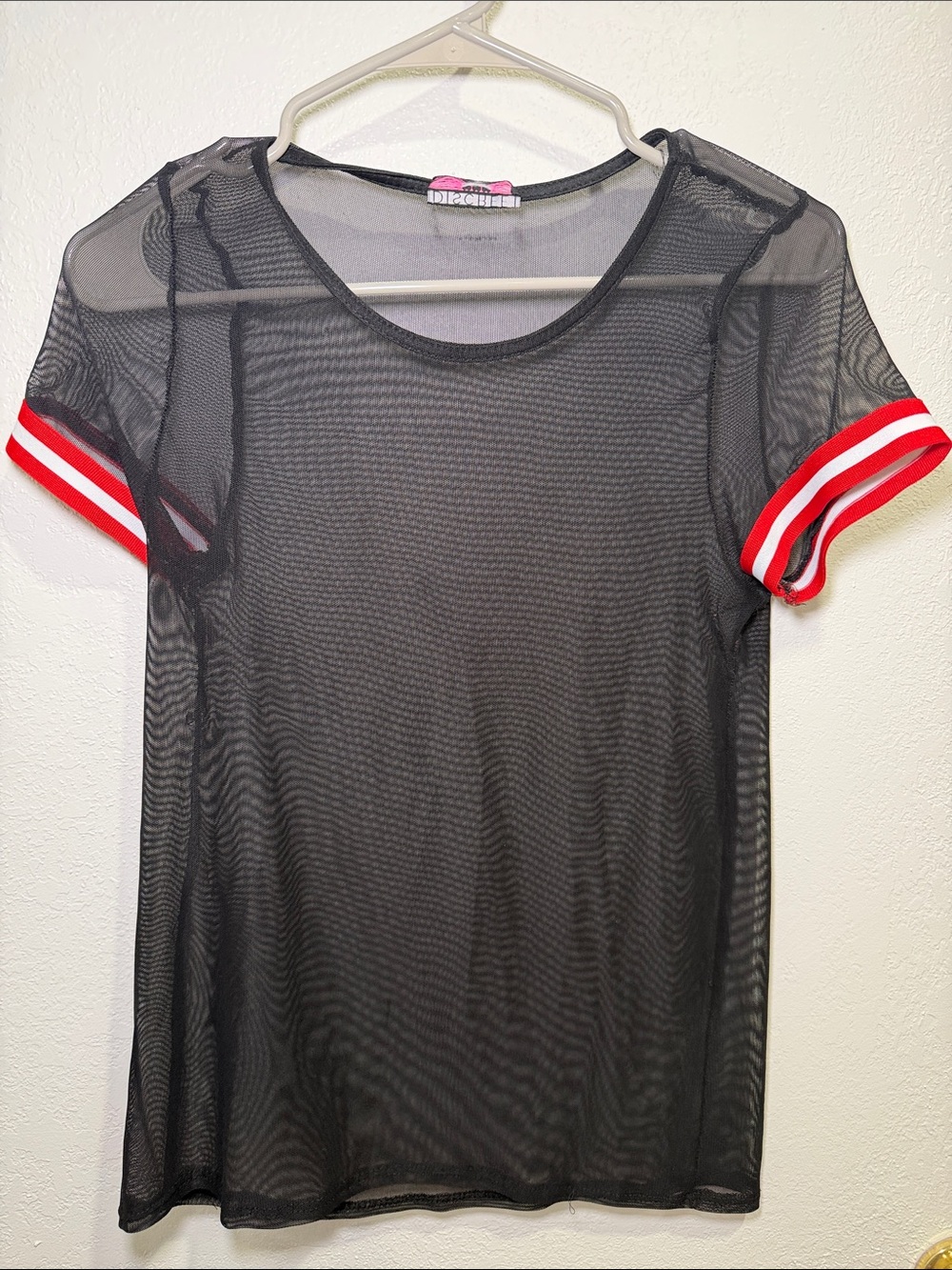 Discreet Black Sheer Mesh Tee with Red and White Striped Cuffs